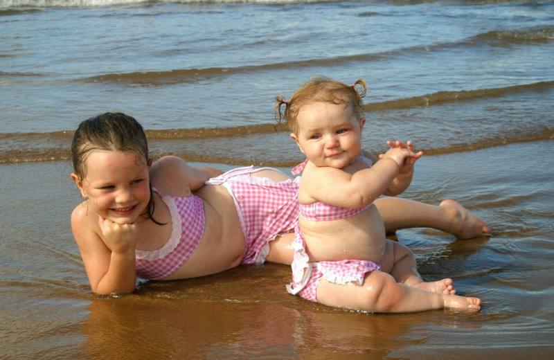 Kids on beach at Treasure Realty.