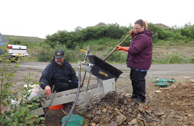 Panning for gold at AkAu Alaska Gold & Resort.