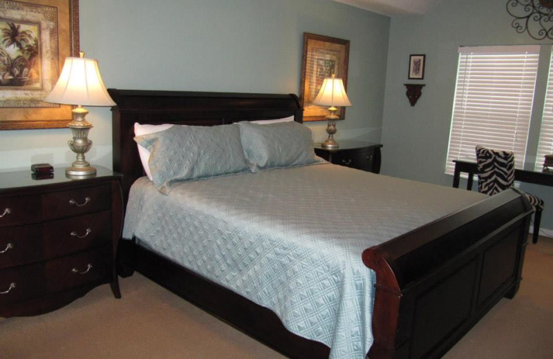 Vacation rental bedroom at Newman-Dailey Resort Properties, Inc. 