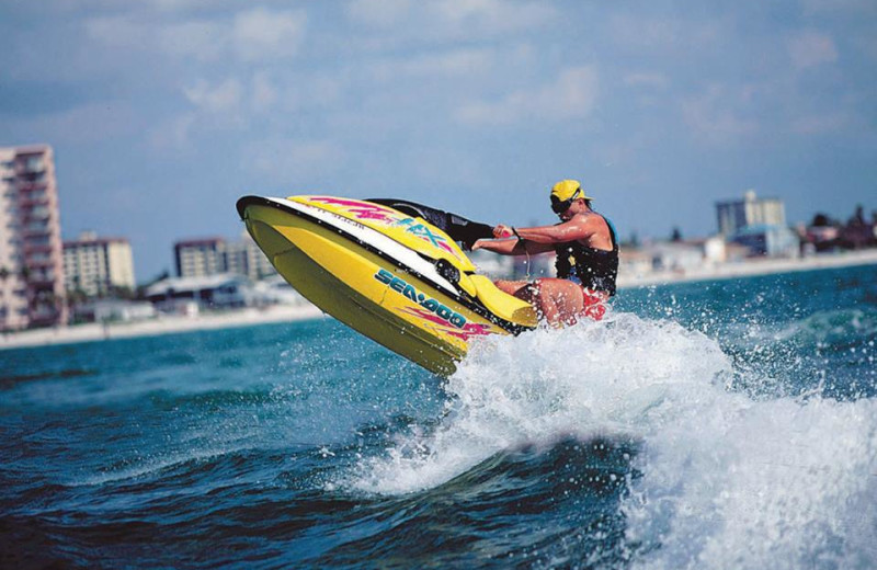 Jet skiing at Sunset Vistas Beachfront Suites.