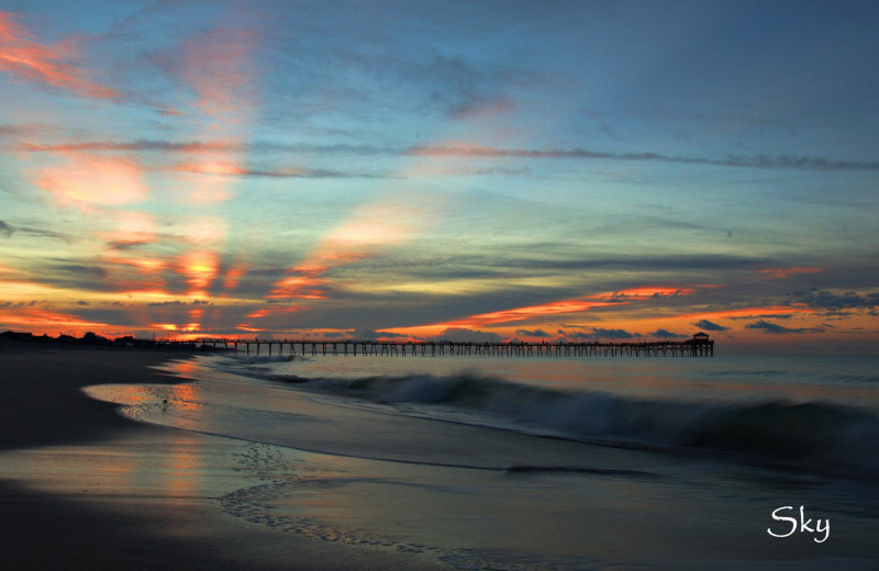 Beach sunset at Realty World - First Coast Realty.