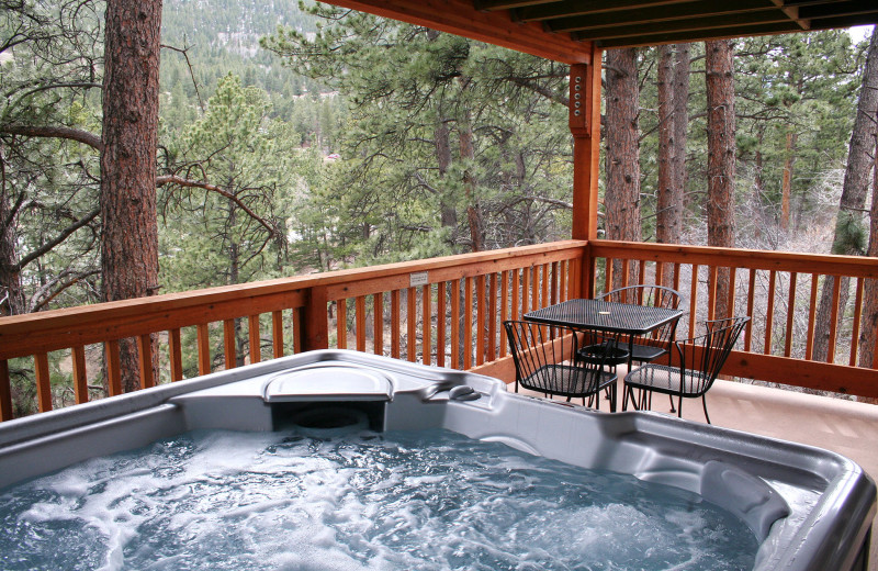 Cottage deck and jacuzzi at Lazy R Cottages.