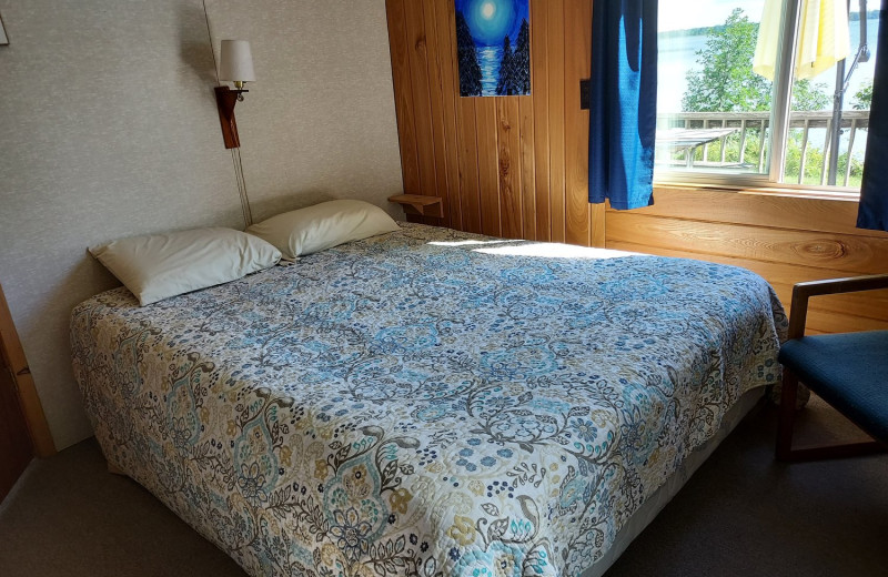 Cottage bedroom at Woodlawn Resort.