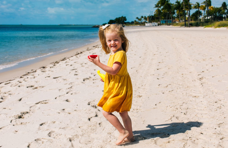 Kid on beach at Margaritaville Beach House Key West.