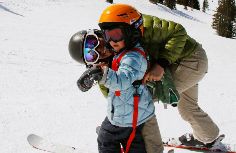 Family skiing at Gingerbread Cabin.