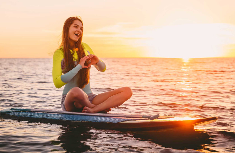 Paddle board at Arnesen's Rocky Point Resort.