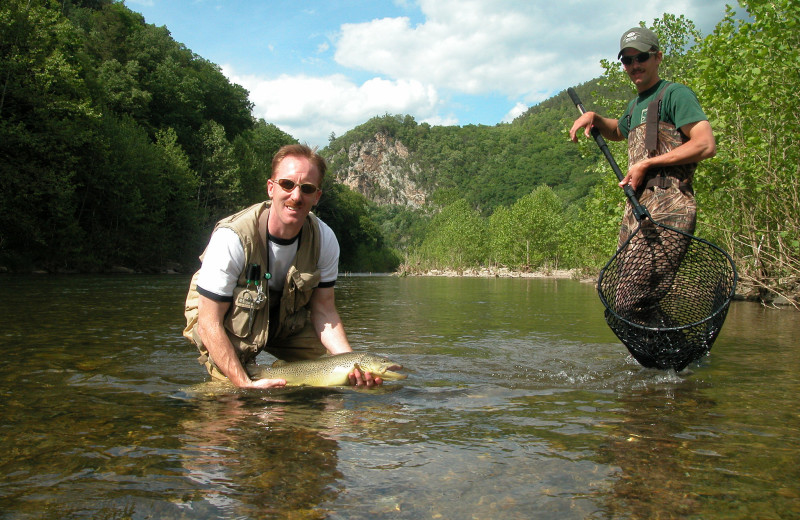 Fishing at Harman's Luxury Log Cabins.