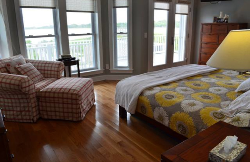 Vacation rental bedroom at Century 21 Action Inc.