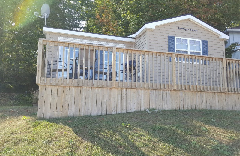 Cottage exterior at Great Blue Resorts- McCreary's Beach Resort.