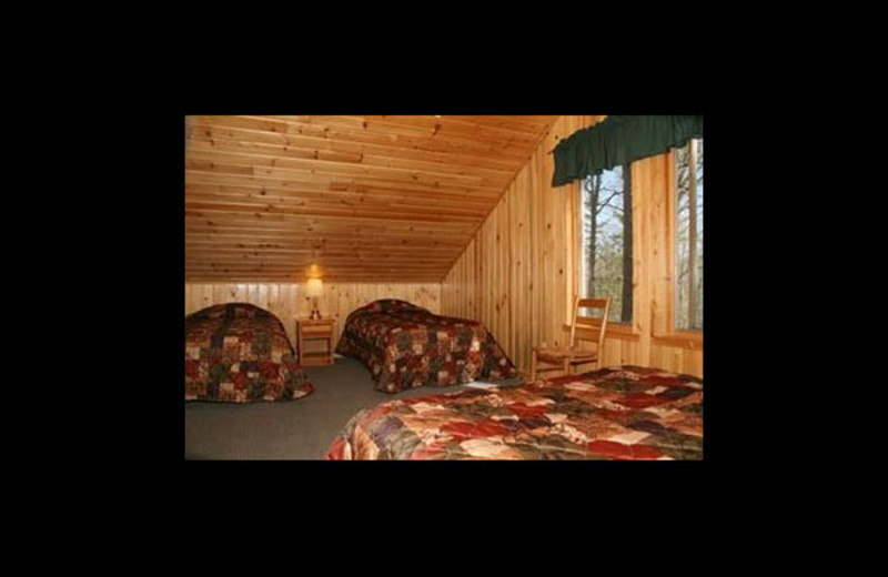 Cabin bedroom at Broadwater Lodge.