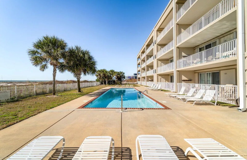 Rental outdoor pool at Beachfront Rentals and Sales.