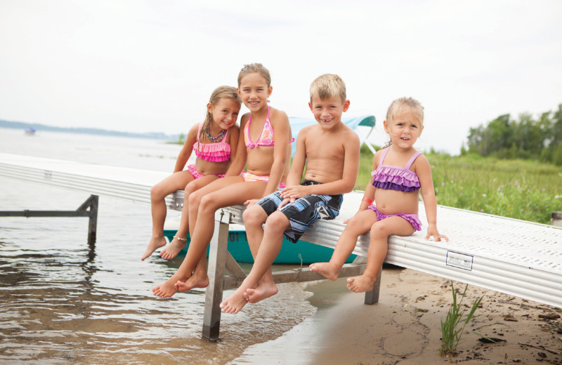 Family on beach at Grand Traverse Resort and Spa.