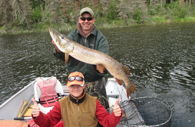 Family fishing at Sandy Beach Lodge.