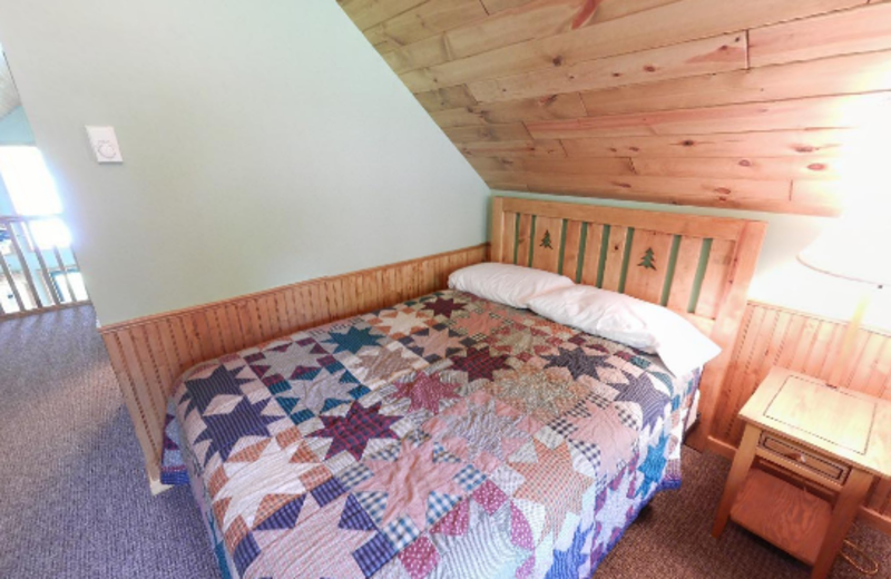 Cabin Bedroom at Janetski's Big Chetac Resort