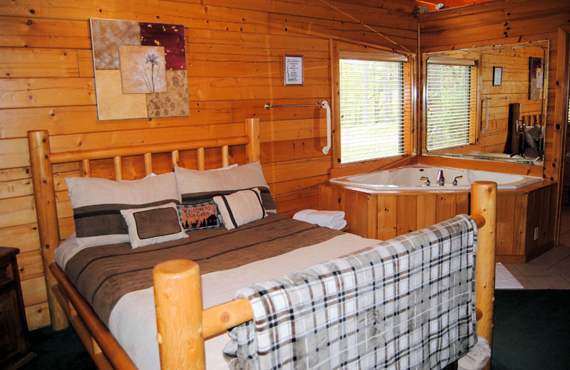 Cabin bedroom at Cabin Fever Resort.