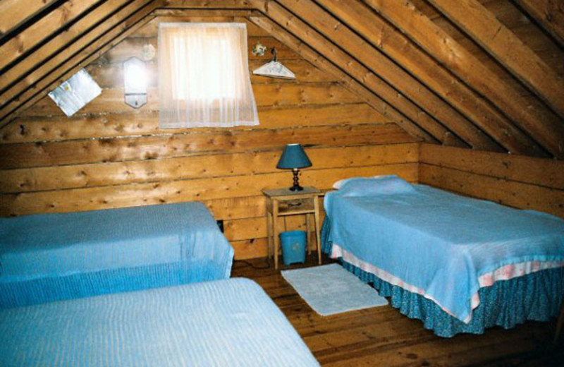 Cabin bedroom at Argyle Lake Lodge.