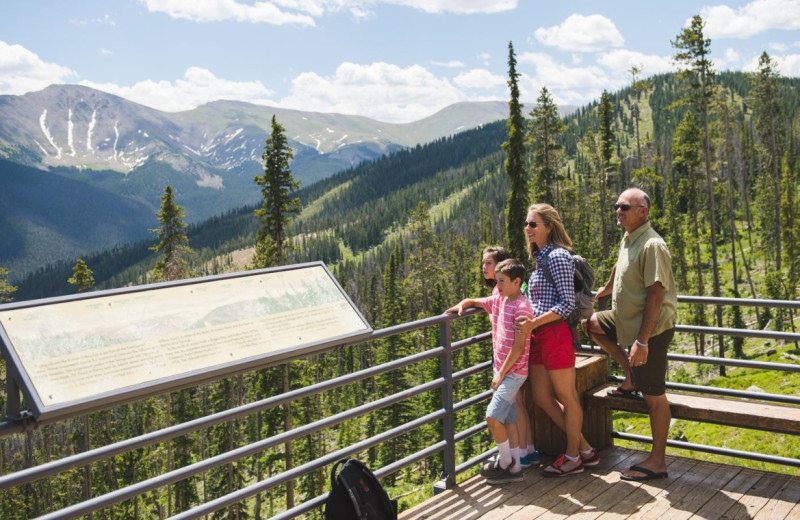 Family hiking near No Moosin' Around Lodging Services.