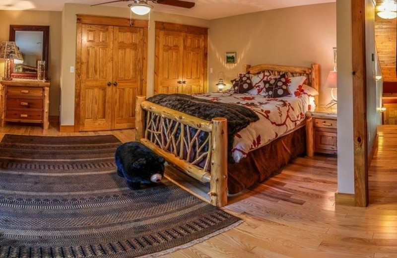 Vacation rental bedroom at Lake Placid Vacation Homes.