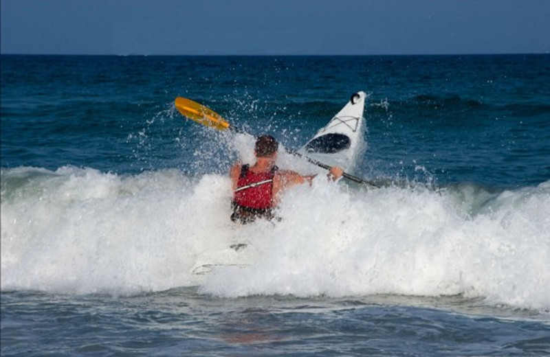 Playing in the ocean at Ocean Isle Inn.