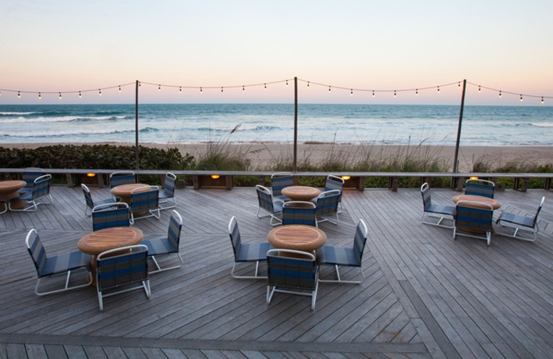 Outdoor dining at Crowne Plaza Melbourne Oceanfront Resort.