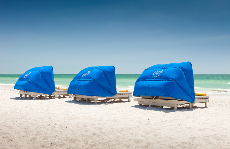 Lounging on the beach at TradeWinds Island Grand.