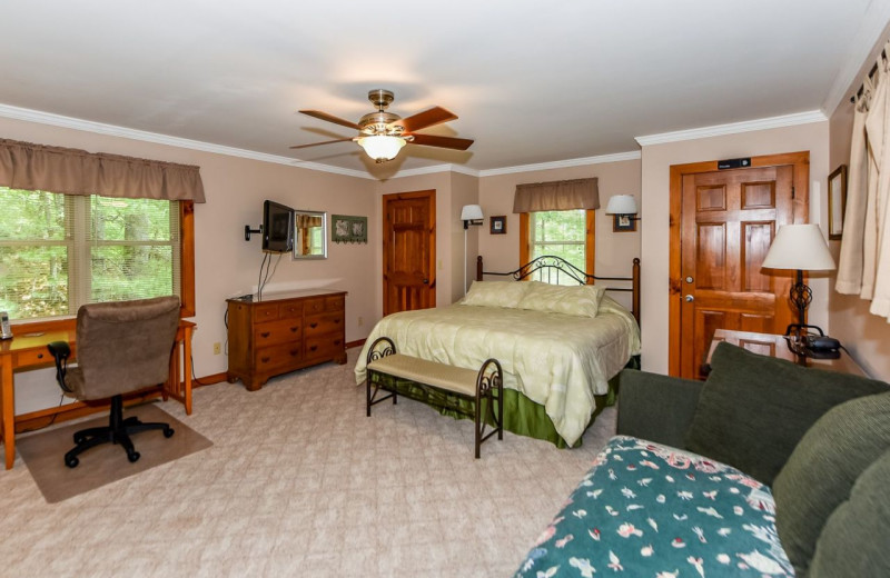 Cabin bedroom at Dogwood Cabins LLC.