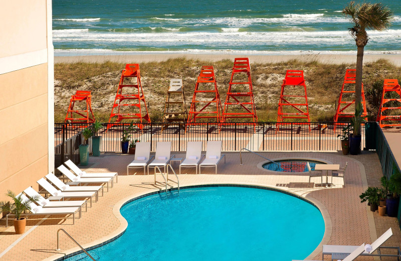 Outdoor pool at Four Points by Sheraton Jacksonville Beachfront.