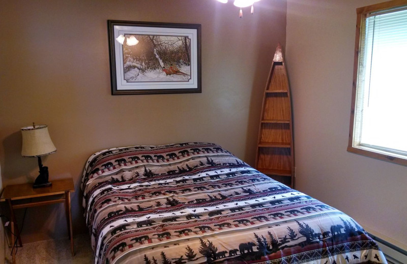 Cabin bedroom at Bliss Point Resort.