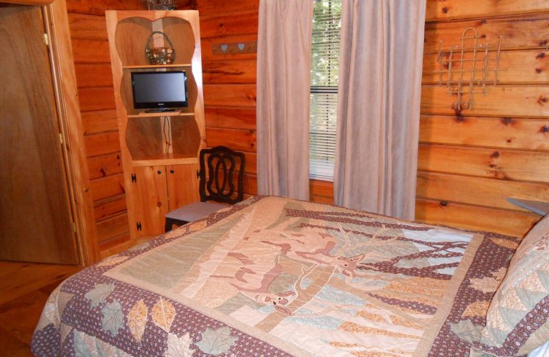 Cabin bedroom at Avenair Mountain Cabins.