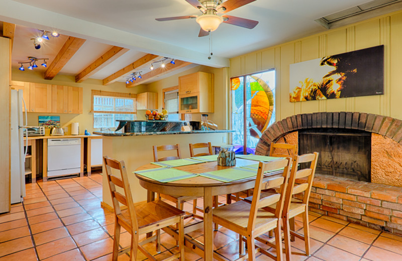 Cottage kitchen and dining room atSeabreeze Vacation Rentals, LLC.