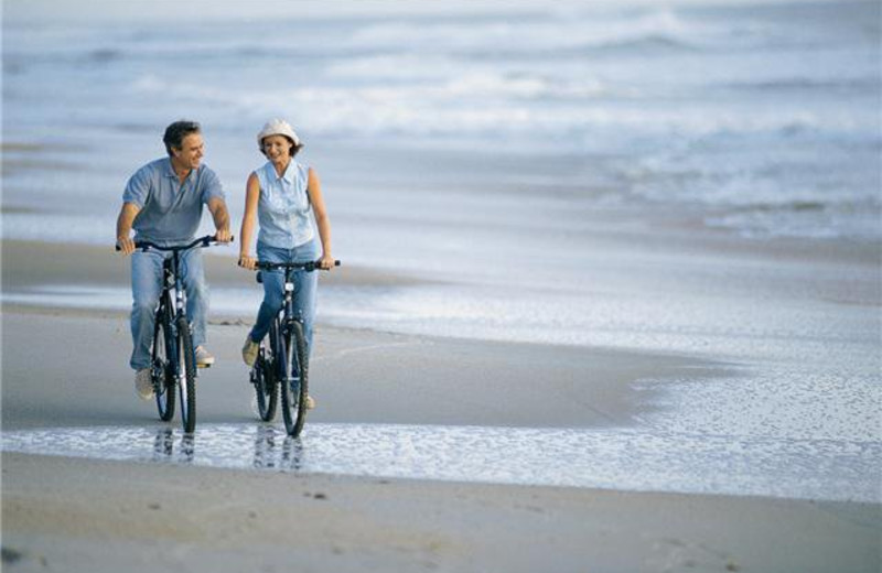 Biking on the Beach at Vacation Time