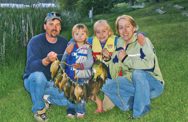 Family fishing at Moonlight Bay Resort.