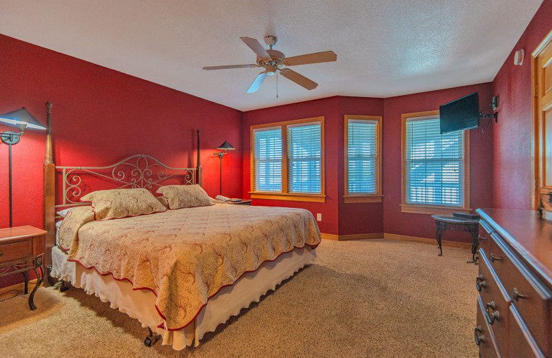 Rental bedroom at Joe Lamb Jr. & Associates Vacation Rentals.