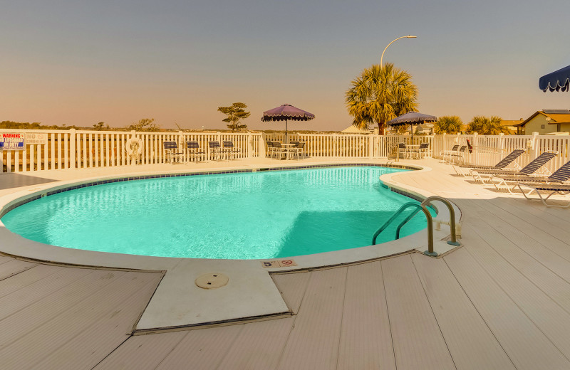 Outdoor pool at Palm Suites.