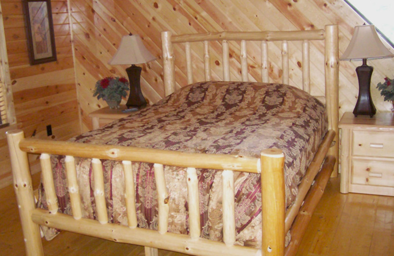 Cabin bedroom at White Oak Lodge & Resort.