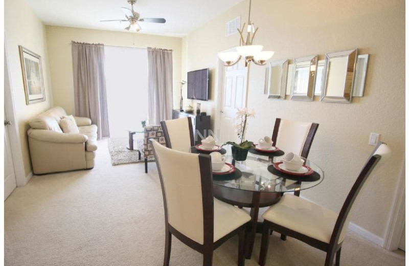 Rental dining and living room at Favorite Vacation Homes.