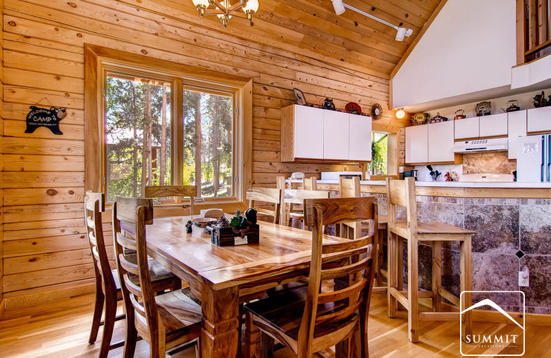 Rental kitchen and dining room at Summit Vacations.