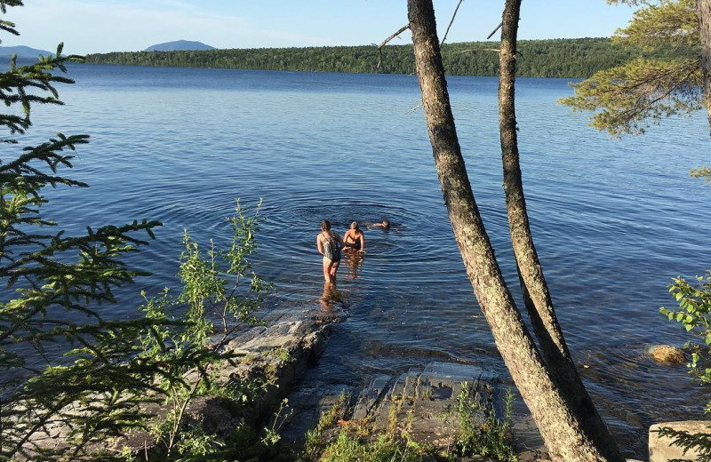 Swimming in lake at Wilsons on Moosehead Lake.