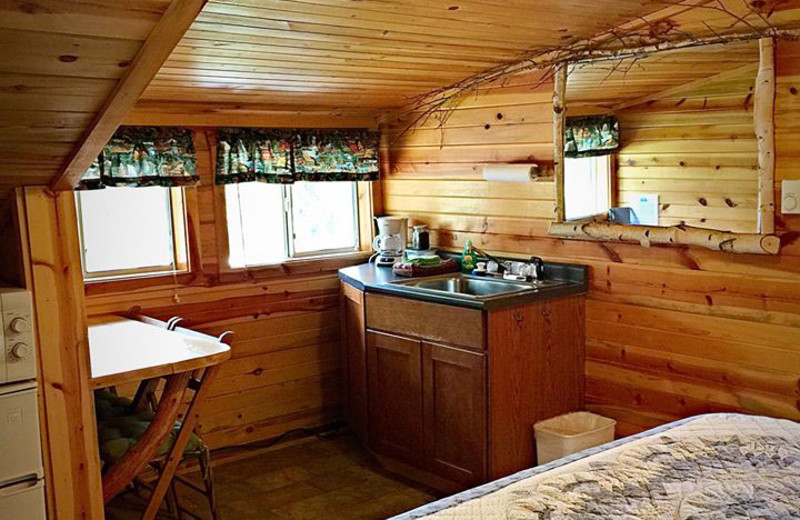 Cabin bedroom at Silver Mountain Resort and Cabins.