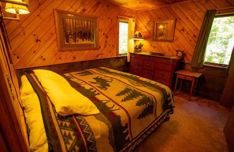 Cabin bedroom at Lake Clear Lodge & Retreat.