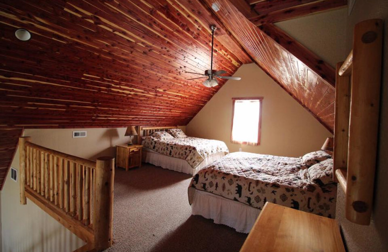 Cottage bedroom at Riverwood Resort.