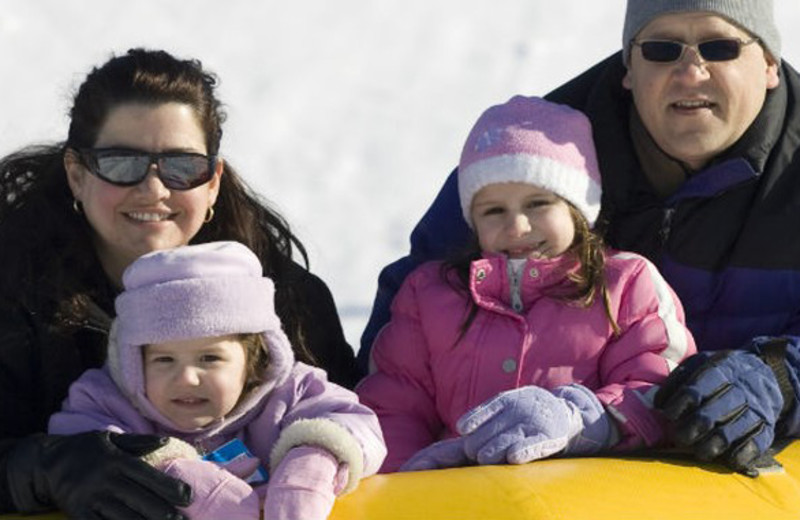 Family snow tubing at Fernwood Resort.