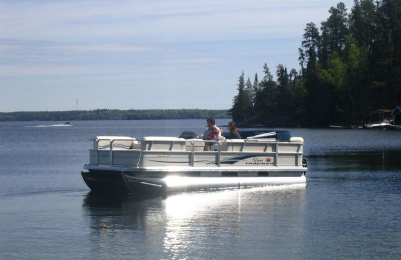 Pontoon boat at Crescent Beach Cottages.