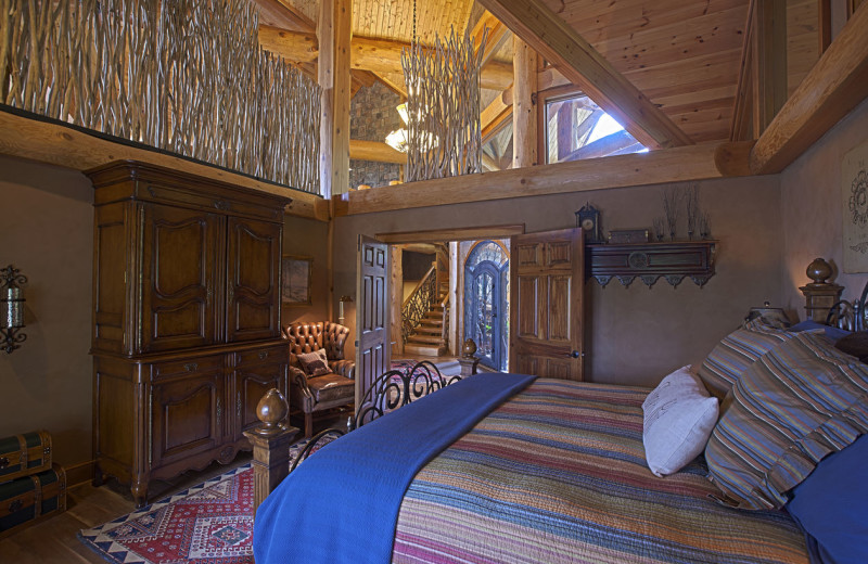 Cabin bedroom at Blue Ridge Vacation Cabins. 