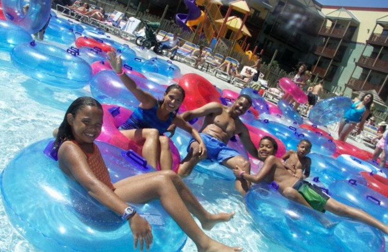 Family swimming at waterpark at Kalahari Waterpark Resort Convention Center.