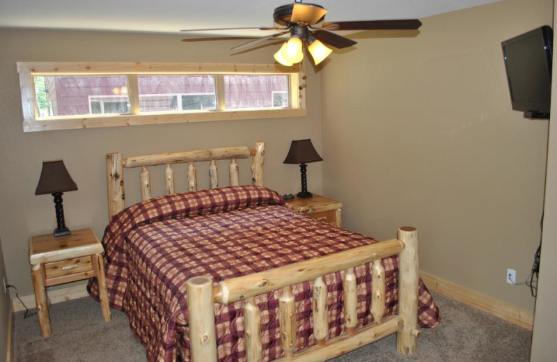 Cabin bedroom at Blue Water Lodge.