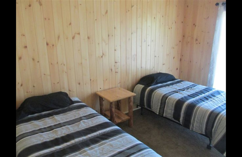 Lodge bedroom at Paradise Cove Resorts.