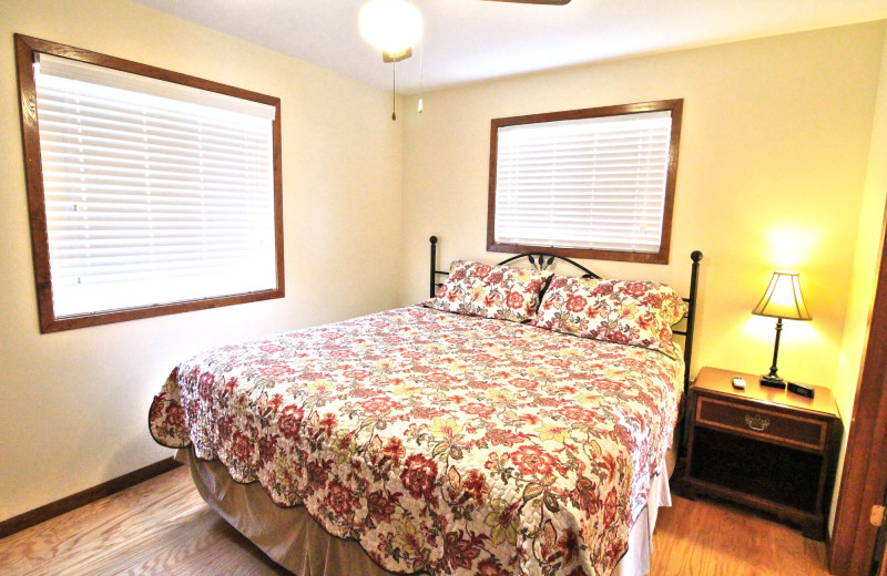 Guest bedroom at Peach Tree Inn & Suites.