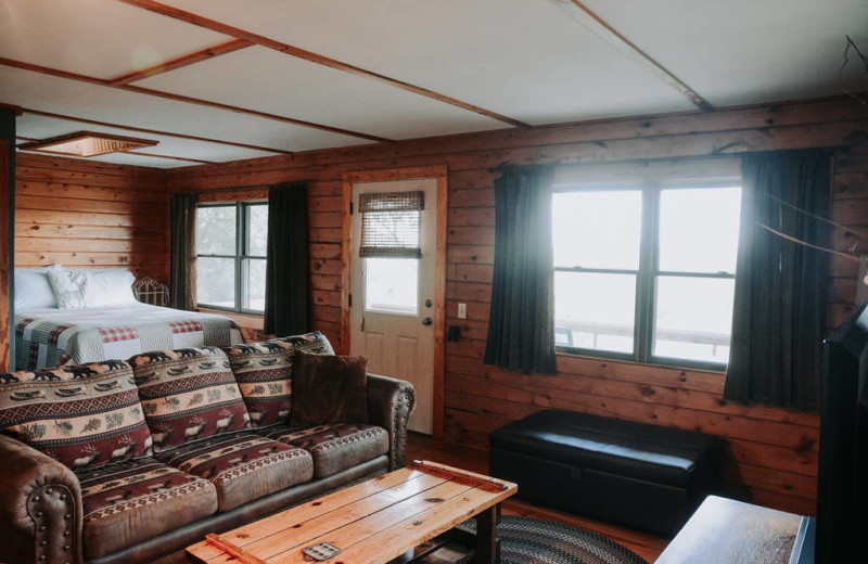 Cabin bedroom at Arkansas White River Cabins.