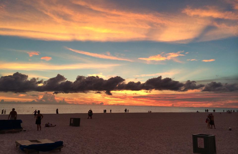 Beach sunset at SunHost Resorts.